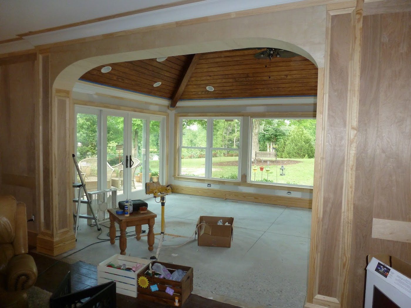 Sunroom framing with a vaulted wood ceiling